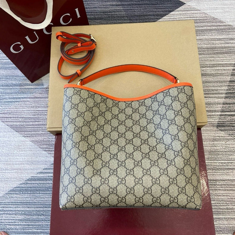 MEDIUM GG EMBLEM BUCKET BAG GUCCI
