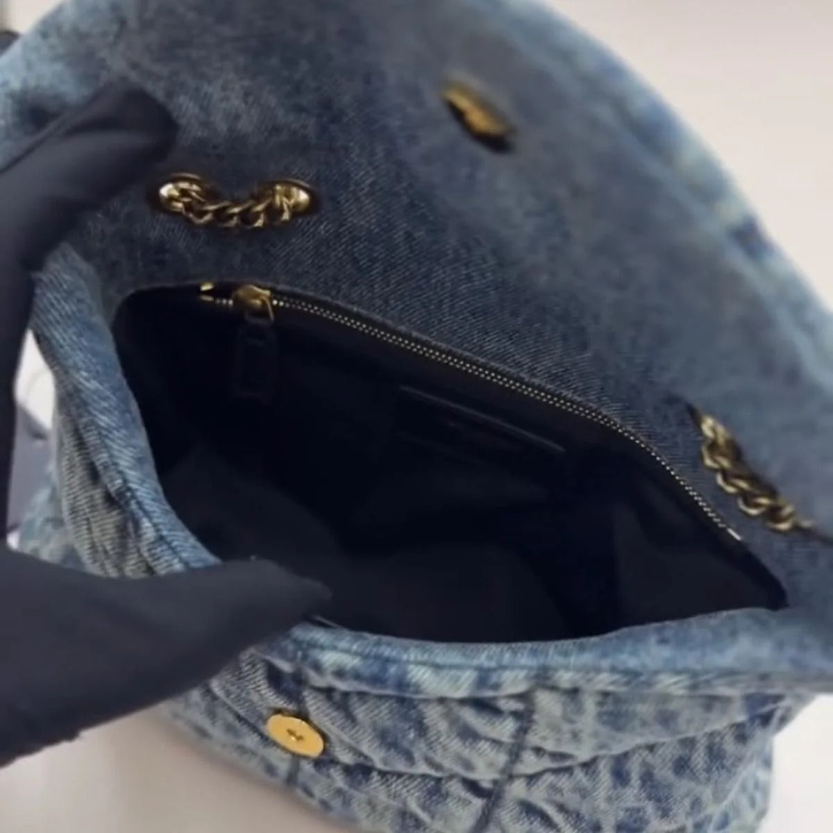 LOULOU PUFFER BAG IN QUILTED VINTAGE DENIM